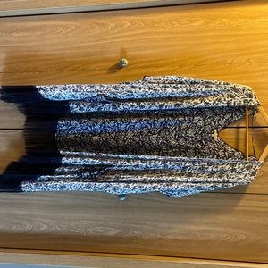 Open tunic with fringe